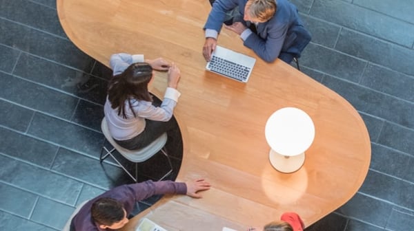 People working around a table