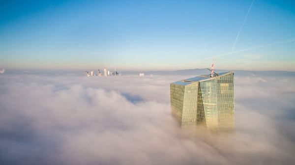 Skyscrapers emerging through the clouds