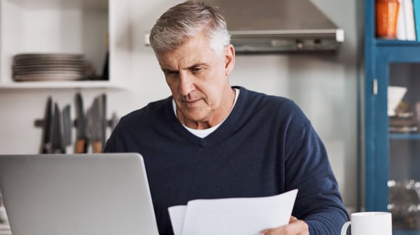 Man staring at laptop