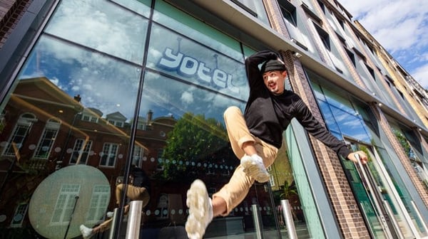 Skateboarder outside a Yotel